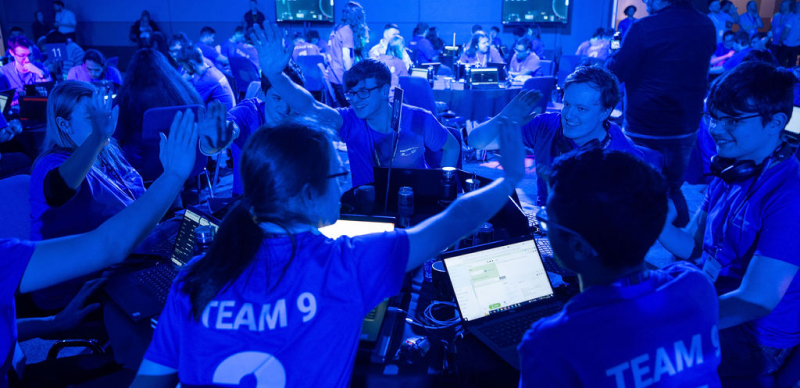 Teams collaborating during the competition