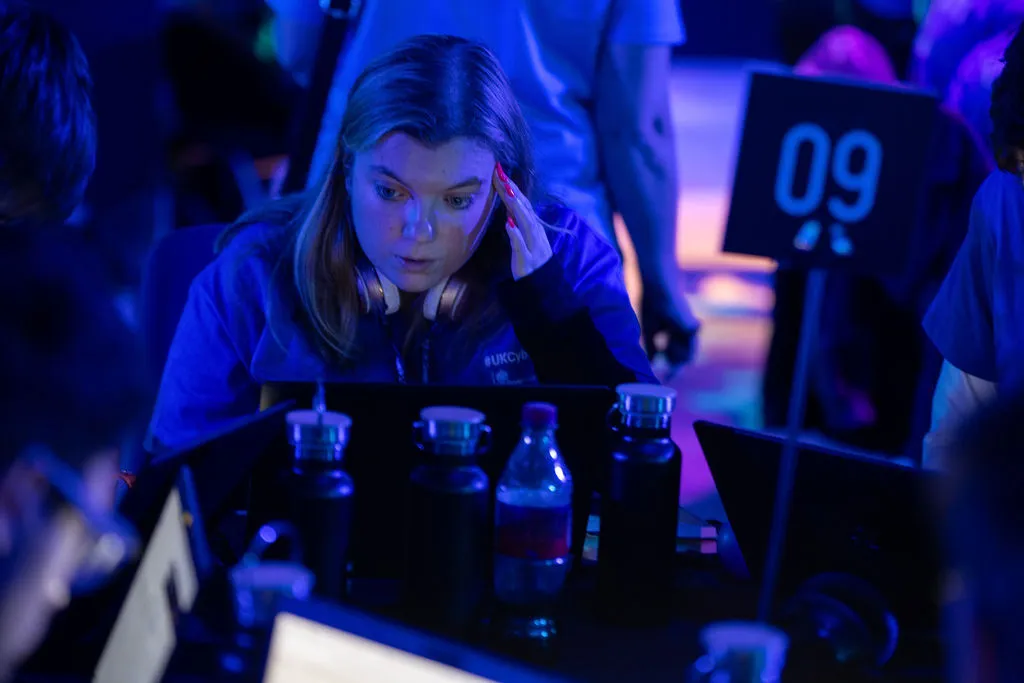 Emily Bridge competing in cybersecurity competition