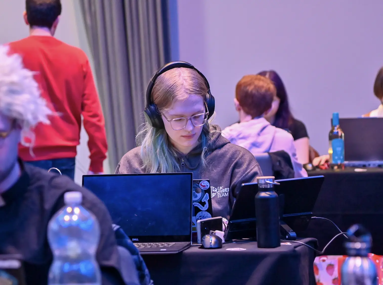 Emily Dennison working on cybersecurity challenges